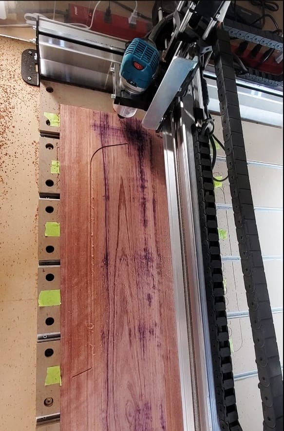 CNC router flattening a long wood slab